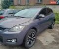 Серый Мазда СХ-7, объемом двигателя 2.3 л и пробегом 198 тыс. км за 7000 $, фото 1 на Automoto.ua