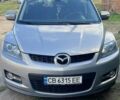 Серый Мазда СХ-7, объемом двигателя 2.26 л и пробегом 253 тыс. км за 6800 $, фото 1 на Automoto.ua