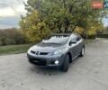 Серый Мазда СХ-7, объемом двигателя 2.3 л и пробегом 185 тыс. км за 6000 $, фото 1 на Automoto.ua