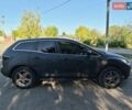 Серый Мазда СХ-7, объемом двигателя 2.3 л и пробегом 270 тыс. км за 6500 $, фото 2 на Automoto.ua