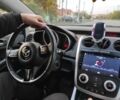 Серый Мазда СХ-7, объемом двигателя 2.3 л и пробегом 235 тыс. км за 6600 $, фото 2 на Automoto.ua
