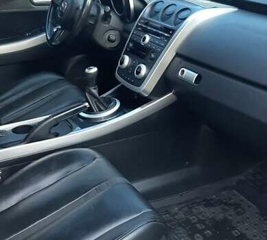 Серый Мазда СХ-7, объемом двигателя 2.26 л и пробегом 190 тыс. км за 7000 $, фото 1 на Automoto.ua