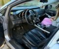 Серый Мазда СХ-7, объемом двигателя 2.3 л и пробегом 250 тыс. км за 5900 $, фото 3 на Automoto.ua