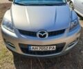 Серый Мазда СХ-7, объемом двигателя 2.3 л и пробегом 250 тыс. км за 6900 $, фото 4 на Automoto.ua