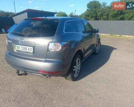 Серый Мазда СХ-7, объемом двигателя 2.2 л и пробегом 247 тыс. км за 9400 $, фото 6 на Automoto.ua