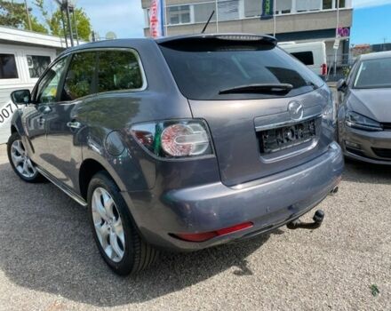 Серый Мазда СХ-7, объемом двигателя 2.2 л и пробегом 215 тыс. км за 6415 $, фото 2 на Automoto.ua