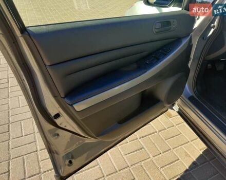 Серый Мазда СХ-7, объемом двигателя 2.49 л и пробегом 217 тыс. км за 7700 $, фото 5 на Automoto.ua