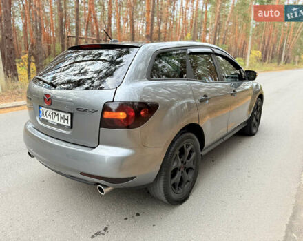 Серый Мазда СХ-7, объемом двигателя 2.26 л и пробегом 175 тыс. км за 7800 $, фото 27 на Automoto.ua