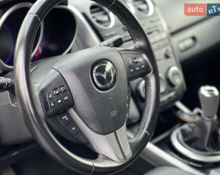 Серый Мазда СХ-7, объемом двигателя 2.18 л и пробегом 240 тыс. км за 11000 $, фото 4 на Automoto.ua