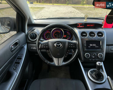 Серый Мазда СХ-7, объемом двигателя 2.2 л и пробегом 233 тыс. км за 10500 $, фото 25 на Automoto.ua