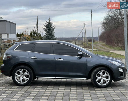 Серый Мазда СХ-7, объемом двигателя 2.2 л и пробегом 200 тыс. км за 9700 $, фото 11 на Automoto.ua