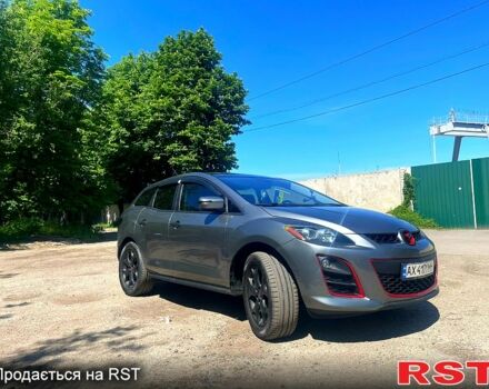 Серый Мазда СХ-7, объемом двигателя 2.3 л и пробегом 137 тыс. км за 6500 $, фото 1 на Automoto.ua