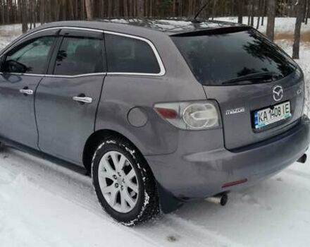 Серый Мазда СХ-7, объемом двигателя 2.26 л и пробегом 276 тыс. км за 6600 $, фото 1 на Automoto.ua