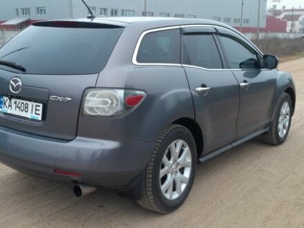 Серый Мазда СХ-7, объемом двигателя 2.3 л и пробегом 235 тыс. км за 6600 $, фото 1 на Automoto.ua