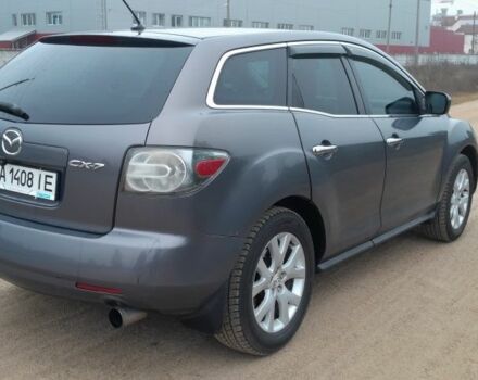 Серый Мазда СХ-7, объемом двигателя 2.3 л и пробегом 235 тыс. км за 6600 $, фото 1 на Automoto.ua