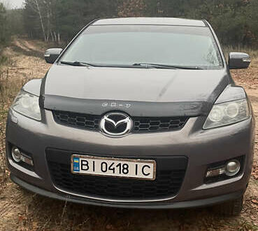 Серый Мазда СХ-7, объемом двигателя 2.26 л и пробегом 209 тыс. км за 7800 $, фото 1 на Automoto.ua