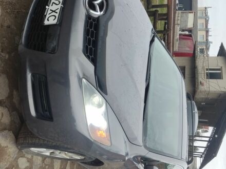 Серый Мазда СХ-7, объемом двигателя 2.3 л и пробегом 235 тыс. км за 7777 $, фото 1 на Automoto.ua