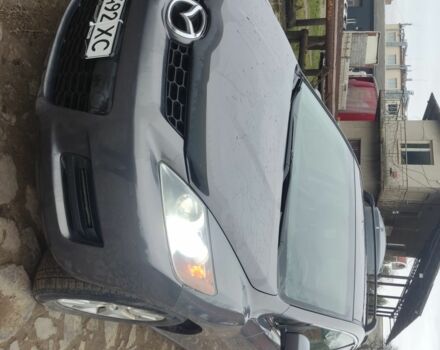 Серый Мазда СХ-7, объемом двигателя 2.3 л и пробегом 235 тыс. км за 7777 $, фото 1 на Automoto.ua