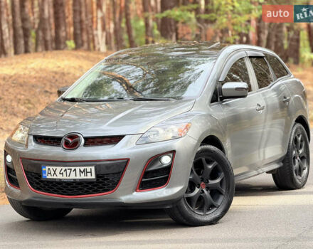Серый Мазда СХ-7, объемом двигателя 2.26 л и пробегом 175 тыс. км за 7800 $, фото 1 на Automoto.ua