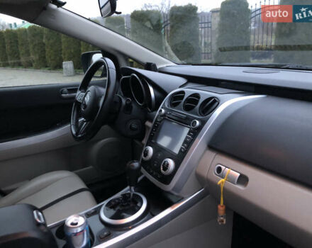 Синій Мазда СХ-7, об'ємом двигуна 2.3 л та пробігом 169 тис. км за 7800 $, фото 38 на Automoto.ua