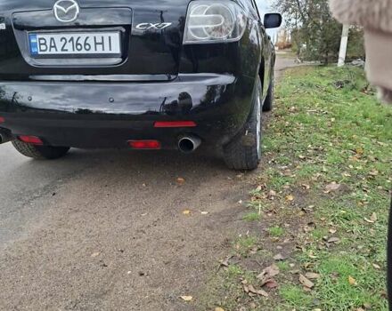 Мазда СХ-7 2007 в Кропивницком (Кировограде) на Automoto.ua Синий Мазда СХ-7, объемом двигателя 2.26 л и пробегом 207 тыс. км за 7000 $, фото 175 на Automoto.ua