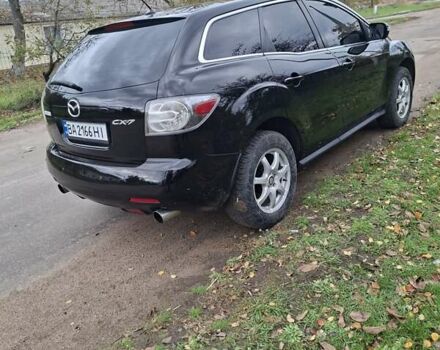 Мазда СХ-7 2007 в Кропивницком (Кировограде) на Automoto.ua Синий Мазда СХ-7, объемом двигателя 2.26 л и пробегом 207 тыс. км за 7000 $, фото 180 на Automoto.ua