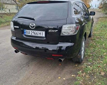 Мазда СХ-7 2007 в Кропивницком (Кировограде) на Automoto.ua Синий Мазда СХ-7, объемом двигателя 2.26 л и пробегом 207 тыс. км за 7000 $, фото 101 на Automoto.ua