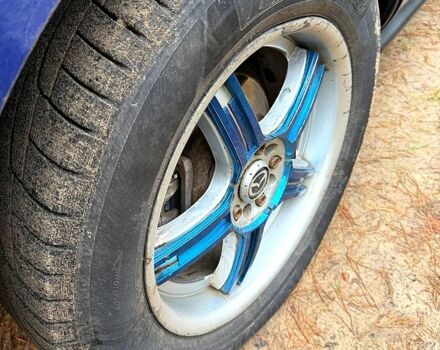 Синий Мазда СХ-7, объемом двигателя 2.3 л и пробегом 223 тыс. км за 6250 $, фото 12 на Automoto.ua