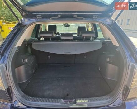 Синій Мазда СХ-7, об'ємом двигуна 2.18 л та пробігом 345 тис. км за 7800 $, фото 12 на Automoto.ua