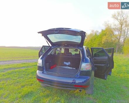 Синий Мазда СХ-7, объемом двигателя 2.18 л и пробегом 148 тыс. км за 11300 $, фото 5 на Automoto.ua