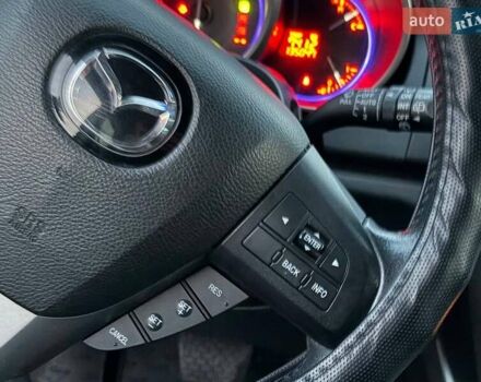 Синій Мазда СХ-7, об'ємом двигуна 2.26 л та пробігом 135 тис. км за 10500 $, фото 27 на Automoto.ua