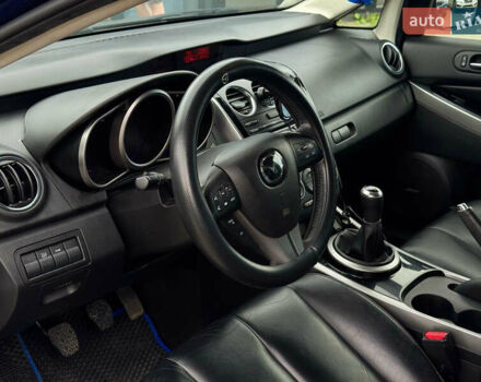 Синий Мазда СХ-7, объемом двигателя 2.2 л и пробегом 228 тыс. км за 9990 $, фото 2 на Automoto.ua