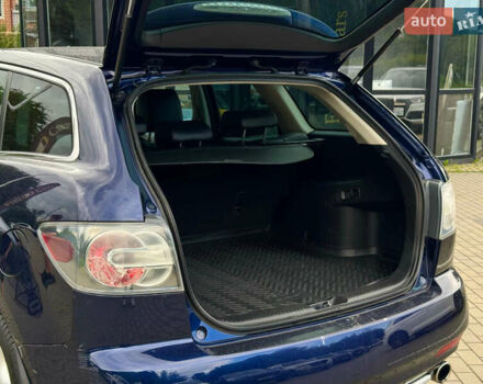 Синий Мазда СХ-7, объемом двигателя 2.2 л и пробегом 228 тыс. км за 9990 $, фото 6 на Automoto.ua
