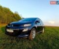 Синий Мазда СХ-7, объемом двигателя 2.18 л и пробегом 148 тыс. км за 11300 $, фото 1 на Automoto.ua