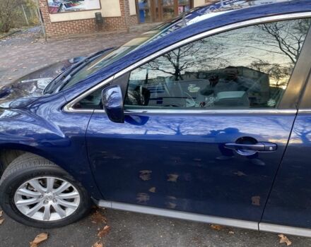 Синий Мазда СХ-7, объемом двигателя 2.5 л и пробегом 274 тыс. км за 9200 $, фото 1 на Automoto.ua