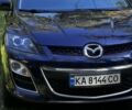 Синий Мазда СХ-7, объемом двигателя 2.3 л и пробегом 135 тыс. км за 12700 $, фото 1 на Automoto.ua