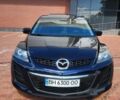 Синий Мазда СХ-7, объемом двигателя 2.5 л и пробегом 280 тыс. км за 8500 $, фото 1 на Automoto.ua