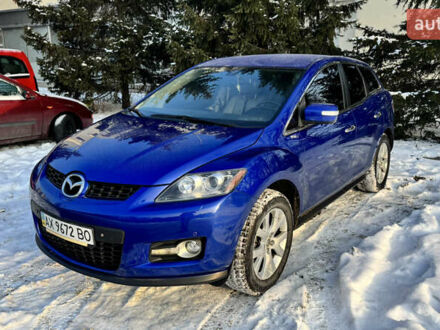 Синий Мазда СХ-7, объемом двигателя 2.3 л и пробегом 117 тыс. км за 6650 $, фото 1 на Automoto.ua