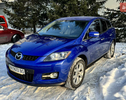 Синий Мазда СХ-7, объемом двигателя 2.3 л и пробегом 117 тыс. км за 6650 $, фото 1 на Automoto.ua