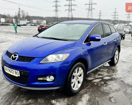 Синий Мазда СХ-7, объемом двигателя 2.3 л и пробегом 117 тыс. км за 6850 $, фото 1 на Automoto.ua