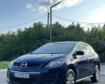 Синий Мазда СХ-7, объемом двигателя 2.5 л и пробегом 250 тыс. км за 7500 $, фото 1 на Automoto.ua