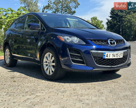 Синий Мазда СХ-7, объемом двигателя 2.5 л и пробегом 227 тыс. км за 8800 $, фото 1 на Automoto.ua
