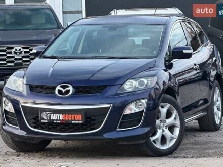 Синий Мазда СХ-7, объемом двигателя 2.26 л и пробегом 135 тыс. км за 10500 $, фото 1 на Automoto.ua