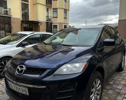 Синий Мазда СХ-7, объемом двигателя 2.5 л и пробегом 238 тыс. км за 8900 $, фото 1 на Automoto.ua
