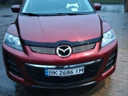Помаранчевий Мазда СХ-7, об'ємом двигуна 2.5 л та пробігом 190 тис. км за 8300 $, фото 1 на Automoto.ua