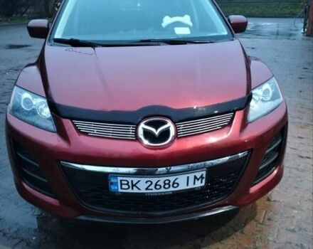 Оранжевый Мазда СХ-7, объемом двигателя 2.5 л и пробегом 190 тыс. км за 8300 $, фото 1 на Automoto.ua