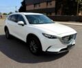 Белый Мазда СХ-9, объемом двигателя 2.5 л и пробегом 30 тыс. км за 7500 $, фото 1 на Automoto.ua