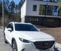 Белый Мазда СХ-9, объемом двигателя 2.49 л и пробегом 100 тыс. км за 18500 $, фото 1 на Automoto.ua