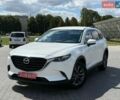 Белый Мазда СХ-9, объемом двигателя 2.49 л и пробегом 200 тыс. км за 14500 $, фото 1 на Automoto.ua