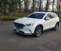 Белый Мазда СХ-9, объемом двигателя 2.49 л и пробегом 104 тыс. км за 30000 $, фото 1 на Automoto.ua
